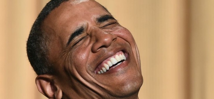 CORRECTION-DATE - US President Barack Obama laughs as he listens performer Joel McHale telling jokes during the White House Correspondents Association Dinner on May 3, 2014 in Washington, DC. AFP PHOTO/Jewel Samad