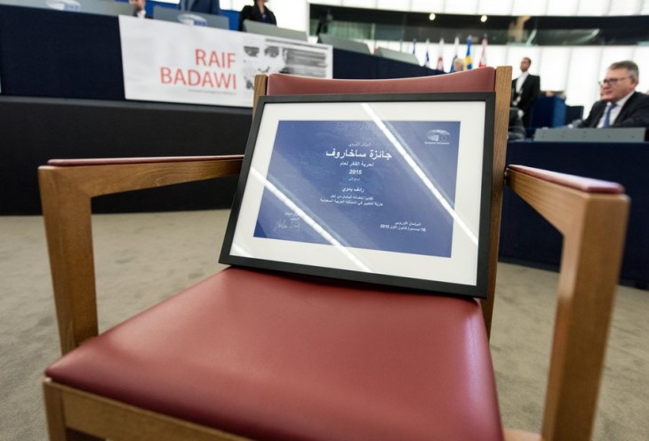 epa05070936 The Sakharov Prize for jailed Saudi blogger Raif Badawi stands on an empty chair in the European Parliament in Strasbourg, France, 16 December 2015. Raif Badawi, who is serving a prison term in Saudi Arabia for allegedly insulting Islam, was awarded the European Parliament's Sakharov Prize for Freedom of Thought on 16 December, due to exceptional courage which had earned him 'one of his country's most gruesome punishments,' parliament President Martin Schulz has said.  EPA/PATRICK SEEGER
