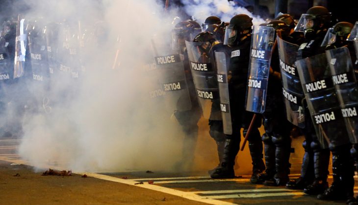 Police hold their lines in uptown Charlotte, NC during a protest of the police shooting of Keith Scott, in Charlotte, North Carolina, U.S. September 21, 2016. REUTERS/Jason Miczek     TPX IMAGES OF THE DAY