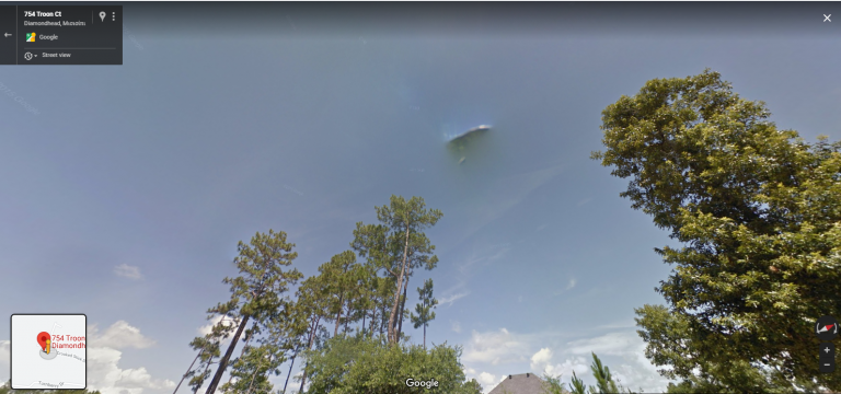 SOMETHING appeared to be PARKED in the daytime sky!