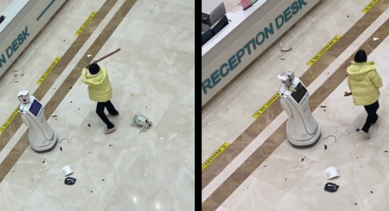 Γυναίκα χτυπάει ένα ρομπότ