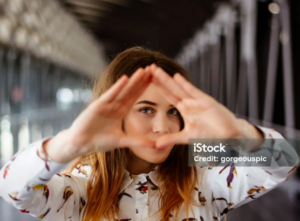 Triangle or diamond hands gesture symbolic analysis